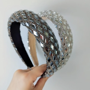 Sparkling crystal padded headband set in grey and silver with geometric rhinestones