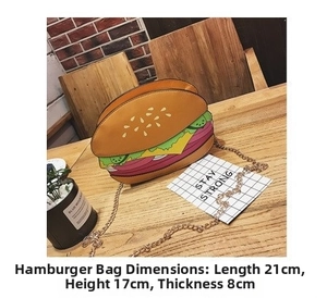Close-up of burger shaped shoulder bag with chain strap and size specs 21x17x8cm
