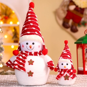 Pair of large plush Christmas snowmen with knitted hats and Welcome star buttons