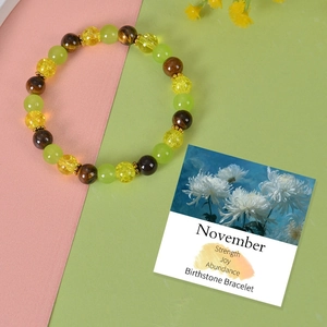 Tiger eye and green bead birthstone bracelet for November with a themed gift card