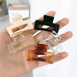 Five-piece set of square hair claws in cream, black, tortoiseshell and frosted finishes