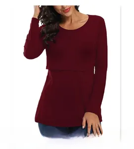 Detail of burgundy long sleeve maternity top showing the practical double-layer nursing access