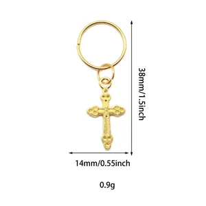 Detailed view of a golden cross pendant for hair jewelry with dimensions 38mm and 0.9g weight