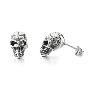Vintage silver skull stud earrings in punk gothic style for men, pair on white background