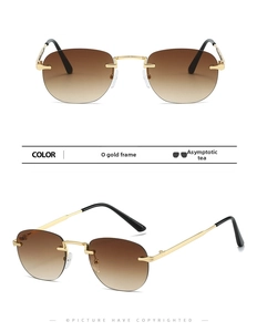 Detail view of gold metal rimless sunglasses with gradient brown lenses and cut edges