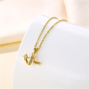 Elegant gold stainless steel wavy chain with a diamond-set star and letter L pendant
