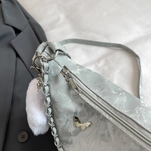Fashionable light grey butterfly shoulder bag with chain strap and marble texture detail