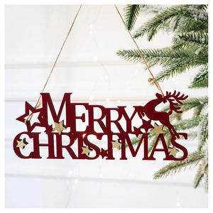 Detail of red Merry Christmas sign with gold glitter stars and reindeer silhouette