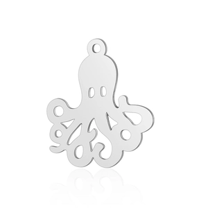 Detailed macro view of an octopus stainless steel pendant with hollow eyes and tentacles