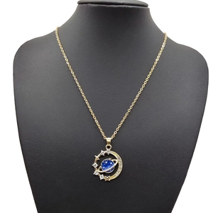 Fashionable blue planet and star moon pendant necklace on a gold chain for women