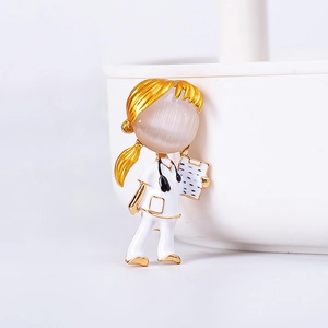Detailed view of nurse brooch with white enamel finish and gold edges on medical uniform