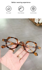 Dettaglio montatura occhiali tartarugati con texture retrò mista rotonda-quadrata