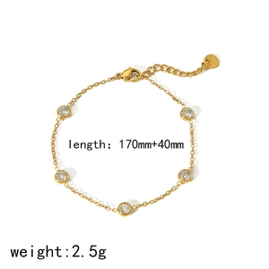 Detail view of 18K gold-plated stainless steel chain with inset zircon stones and lobster clasp