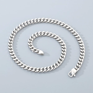Detailed view of silver 8mm stainless steel Cuban link chain with a polished finish