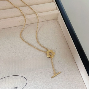 925 silver flower pendant gold bead necklace with vintage OT clasp on jewelry box