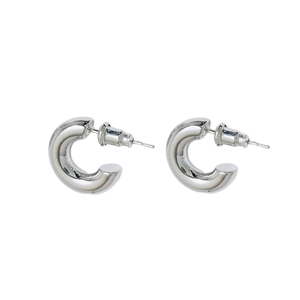 Minimalist silver-tone thick C-shape hoop earrings with polished metal finish and backs