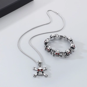 Gothic skull necklace and bracelet set with red stone eyes in silver stainless steel