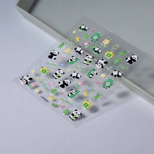 Close-up of 3D embossed panda nail stickers with bamboo and floral decorative elements
