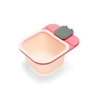 Pink and orange rotating desktop mini trash bin for kitchen waste storage and organization