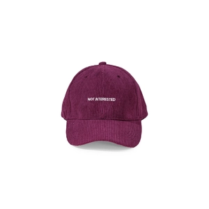 Detail showing high-quality corduroy texture and white embroidery on berry red baseball cap