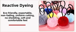 Detailed view of colorful plush pompom hair ties with high elasticity black bands
