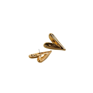 Polished gold heart stud earrings with a minimalist metallic design on white background