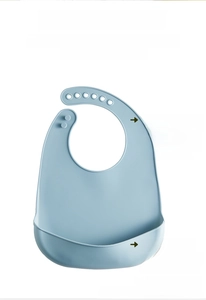 Detail of adjustable silicone baby bib with 3D deep food catcher pocket in light blue