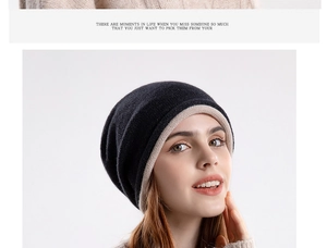 Detail of winter knit beanie showing two-tone black and beige color splicing texture