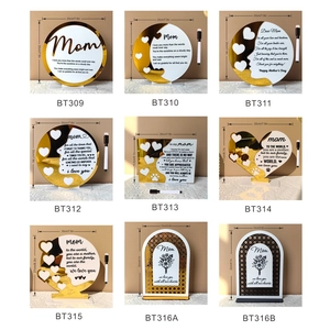 Acrylic Mother's Day table ornaments in gold and white with warm holiday greetings