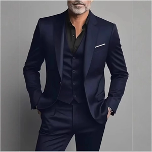 Slim fit men's three-piece business suit in navy blue with blazer, vest and trousers