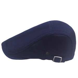 Detail view of the breathable navy mesh beret with adjustable silver metal side buckle