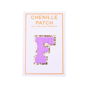 Detailed view of purple chenille letter F patch with gold sequins and adhesive backing