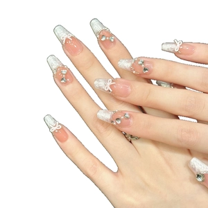 French style press-on nails with long trapezoid shape, 3D white bow and pearls