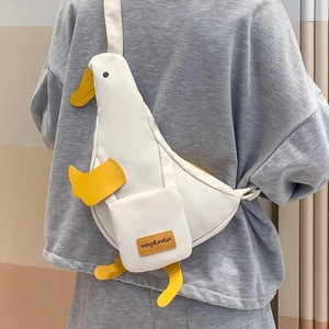 Unisex white canvas goose crossbody bag with adjustable strap and cartoon features