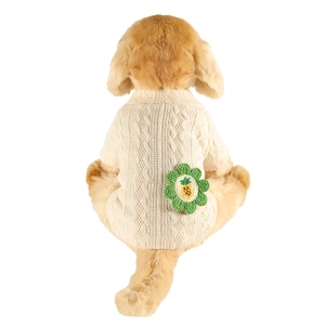 Beige knitted dog sweater featuring green floral patterns and 3D flower decoration