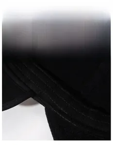 Macro detail of breathable black inner sweatband with reinforced stitching on winter wool cap