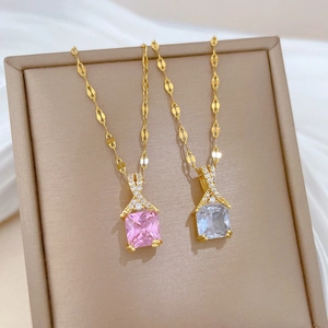 Elegant gold titanium cross necklaces with pink and light blue square crystal pendants
