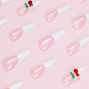 Long ballerina press-on nails with nude pink base, white tips and 3D cherry rhinestone decor