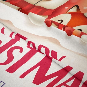 Close-up of soft flannel fabric featuring a festive Christmas fox and textile texture