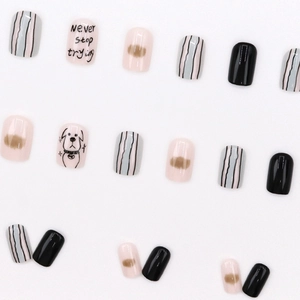 Kurze Kunstnägel Set mit niedlichen Welpenmotiven und bunten Linienkunst-Designs