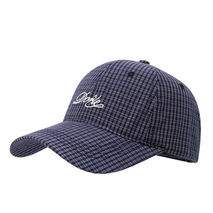Classic navy plaid baseball cap with white script embroidery and vintage styling