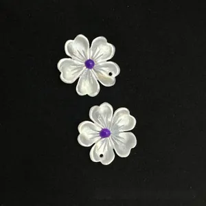 Hand-carved shell flower pendants with purple beads for handmade jewelry making