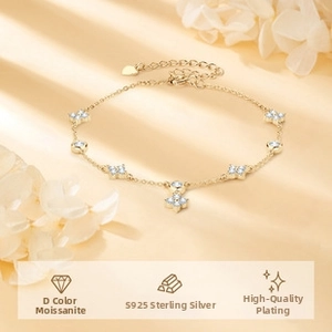Detail of S925 silver tennis bracelet featuring D color moissanite flower charms
