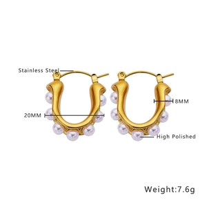 Detail view of U-shaped gold stainless steel earrings with white pearls and dimensions