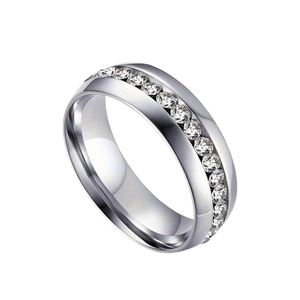 Detailed view of silver alloy wedding ring with channel-set round cubic zirconia stones