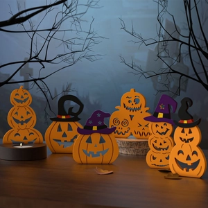 Three-tier Halloween pumpkin wood signs with witch hats for spooky home decor setup