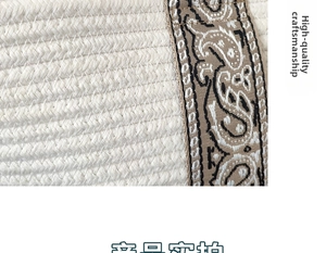 Close-up of cream woven cotton handbag featuring detailed paisley pattern straps