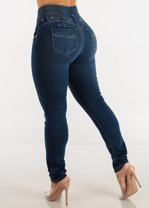 Detailed back view of high waisted dark blue skinny jeans with push-up effect