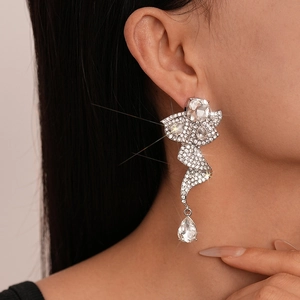 Luxury silver flower earrings with dripping crystals and tassel for wedding and gala