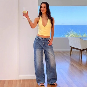 Women's yellow halter v-neck top and high waist wide leg washed denim jeans set